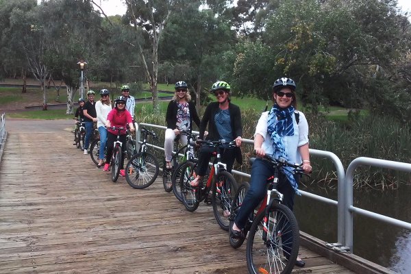 riding over the river torrens bridge on the linear trail